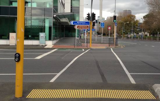 Controlled pedestrian crossing with tactile paving raised domes