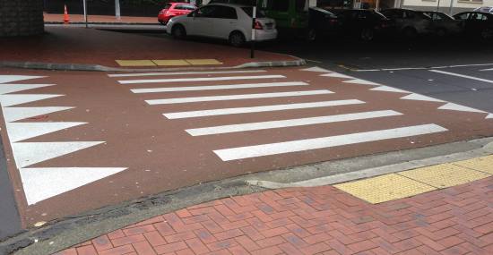 Raised crossing with tactile paving