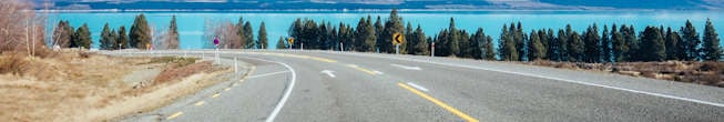 New Zealand road through green hills