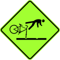 120px-New_Zealand_Permanent_Warning_-_Cyclists_Take_Care_on_Rail_Tracks_(fluorescent).svg