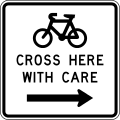 New_Zealand_General_Advisory_-_Cyclists_Cross_Here_With_Care_(right).svg