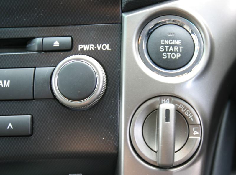 https://www.drivingtests.co.nz/resources/wp-content/uploads/2014/05/Toyota-Land-Cruiser-200-VX-Ltd-start-button.jpg