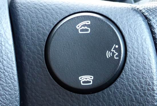 Phone command buttons on steering wheel