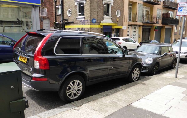 cars parked facing one another