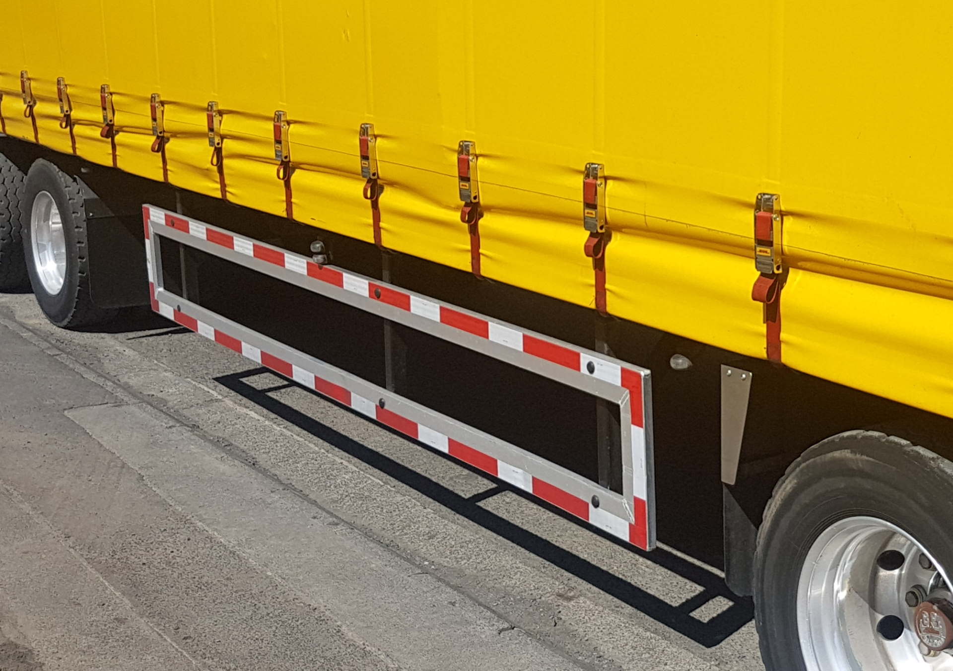 What is side underrun protection on a truck or trailer?