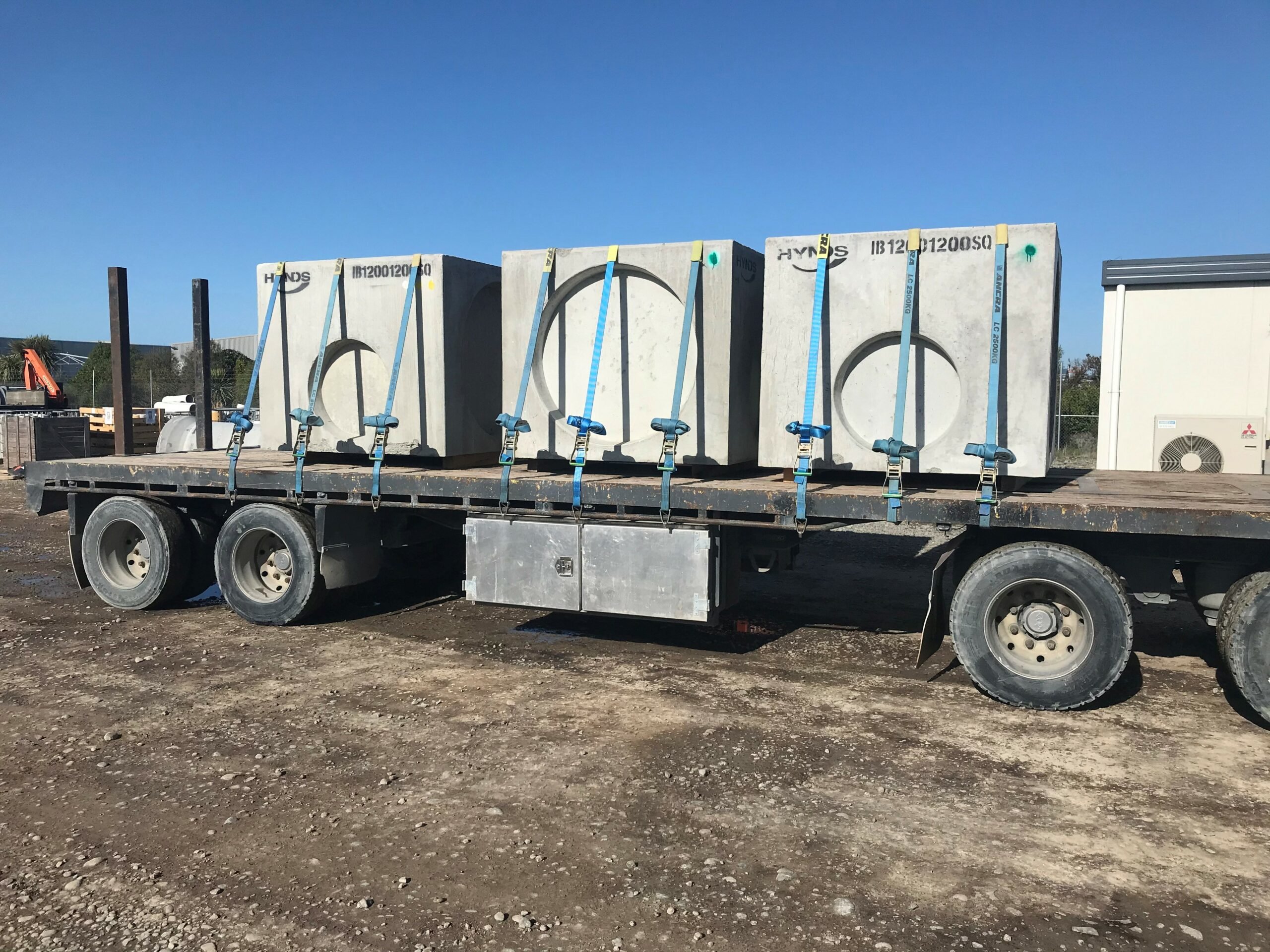 What is a flat deck truck or trailer?